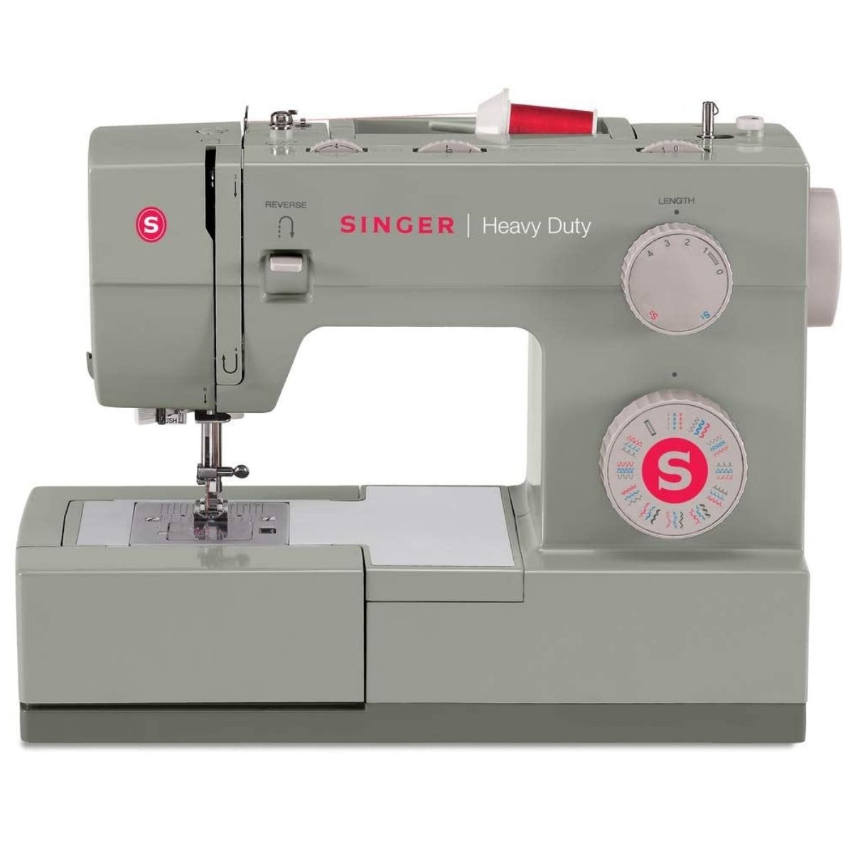 a gray singer sewing machine with large round knobs on the front with bright red letting 